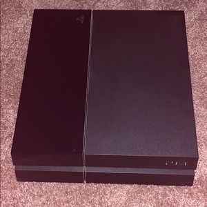 PlayStation four with 3 controllers and 7 games